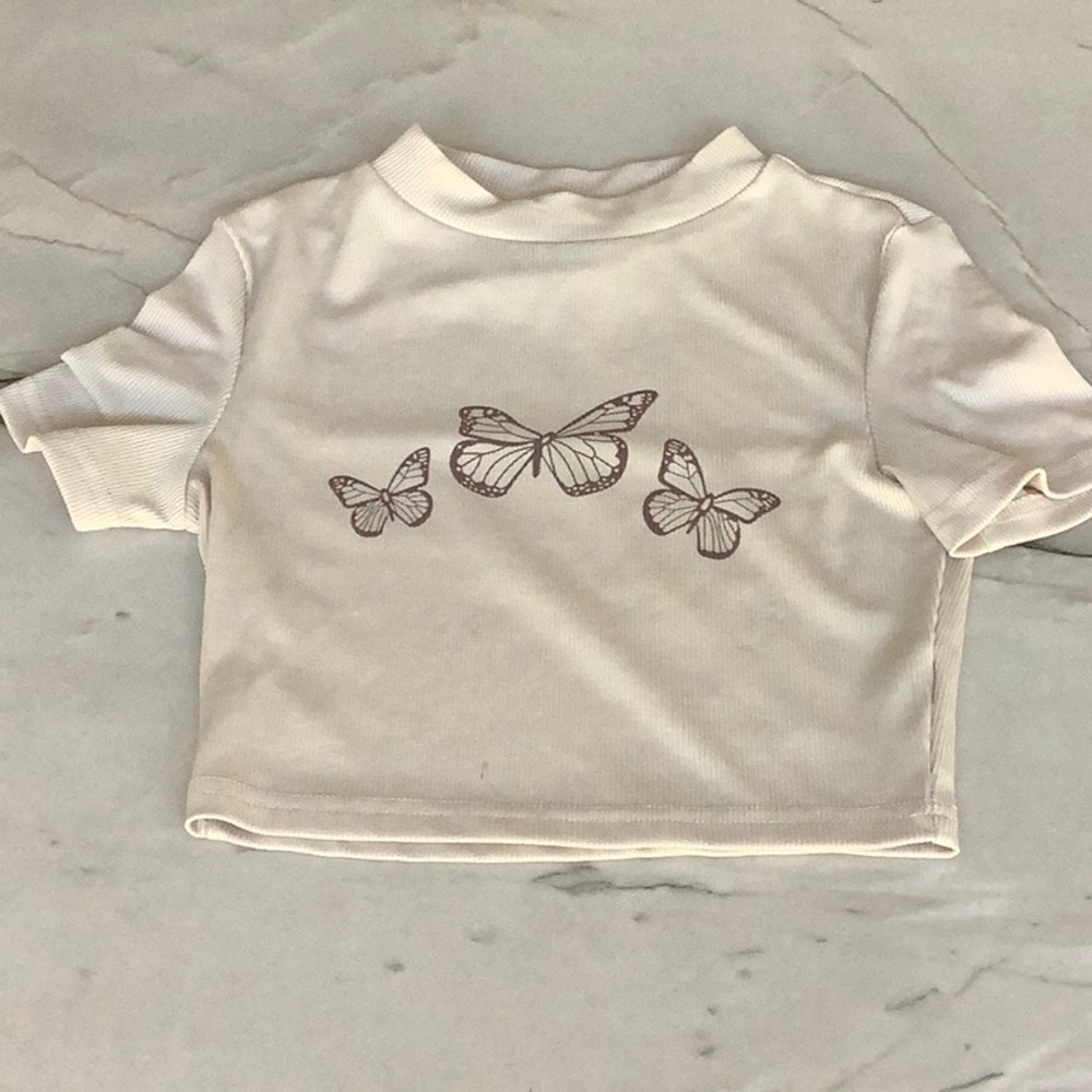 Cream color crop top with brown butterfly